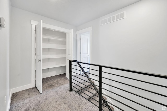 6512 S 390 E, South Weber, UT 84405 - hall featuring carpet floors, an upstairs landing, visible vents, and baseboards