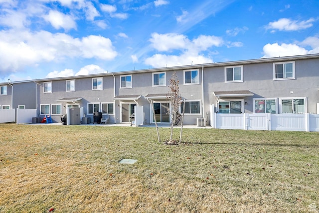 6512 S 390 E, South Weber, UT 84405 - back of house featuring a patio, a yard, fence, and stucco siding