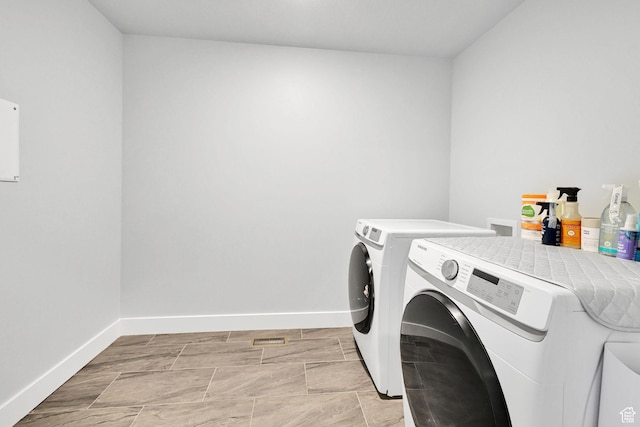 6512 S 390 E, South Weber, UT 84405 - washroom featuring laundry area, baseboards, and separate washer and dryer