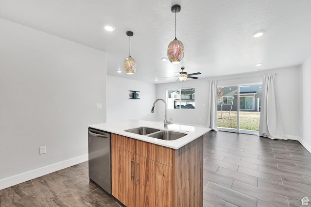 6512 S 390 E, South Weber, UT 84405 - kitchen with stainless steel dishwasher, a sink, an island with sink, modern cabinets, and baseboards