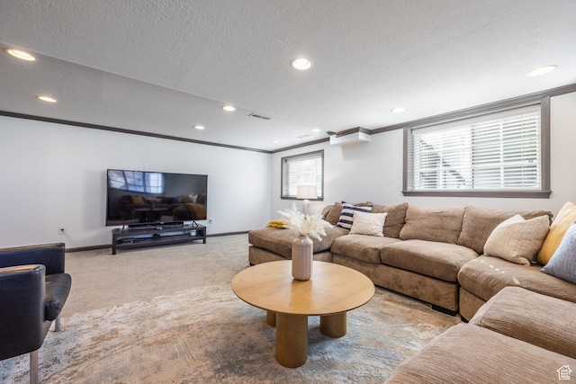 living room with baseboards, ornamental molding, carpet floors, recessed lighting, and a textured ceiling