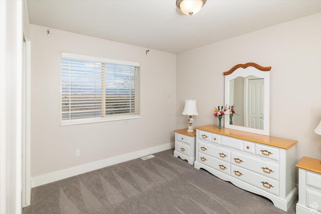 10285 N 7600 W, Tremonton, UT 84337 - bedroom with baseboards, visible vents, and dark carpet