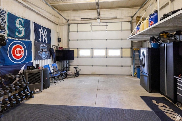 10285 N 7600 W, Tremonton, UT 84337 - garage featuring refrigerator with ice dispenser
