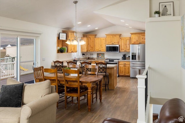 10285 N 7600 W, Tremonton, UT 84337 - dining area with an inviting chandelier, vaulted ceiling, wood finished floors, and recessed lighting