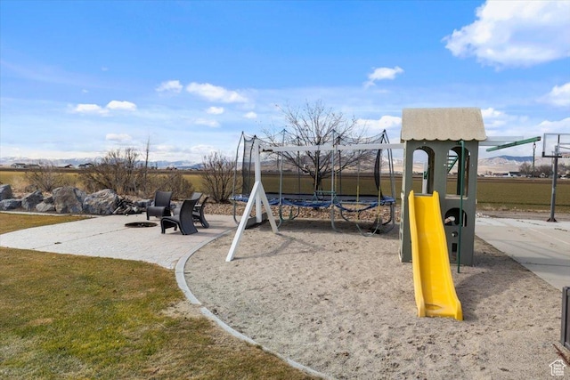 10285 N 7600 W, Tremonton, UT 84337 - community playground featuring a lawn