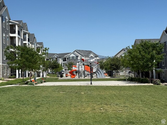 14648 S Mckellen Dr W Unit B203, Herriman, UT 84096 - surrounding community featuring a residential view and a yard