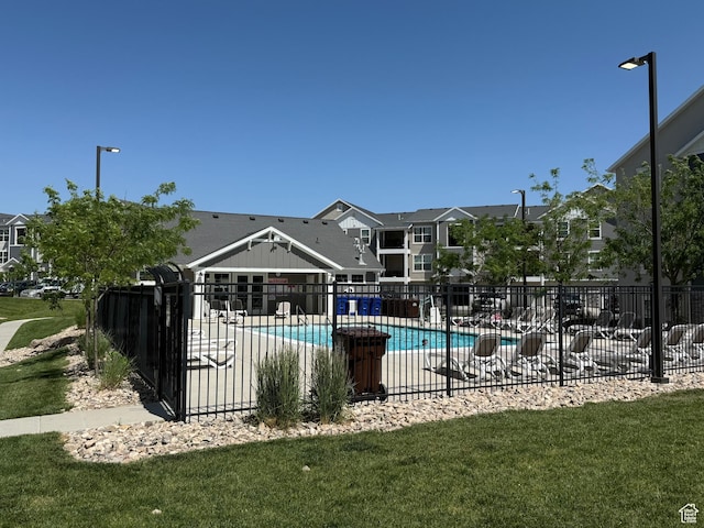 14648 S Mckellen Dr W Unit B203, Herriman, UT 84096 - community pool featuring a residential view and a patio
