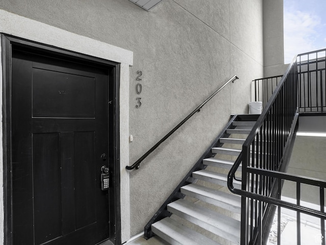 14648 S Mckellen Dr W Unit B203, Herriman, UT 84096 - property entrance featuring stucco siding