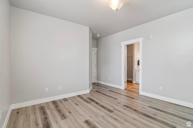 14648 S Mckellen Dr W Unit B203, Herriman, UT 84096 - unfurnished room featuring wood finished floors and baseboards