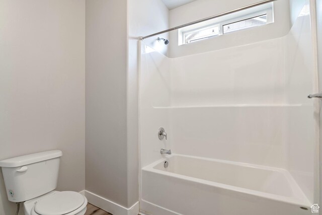 14648 S Mckellen Dr W Unit B203, Herriman, UT 84096 - bathroom with toilet, tub / shower combination, and baseboards