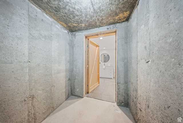 hallway featuring concrete floors
