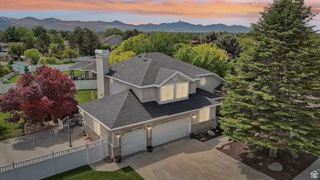 11732 S Lampton View Dr W, South Jordan, UT 84095 - aerial view at dusk of a mountain view