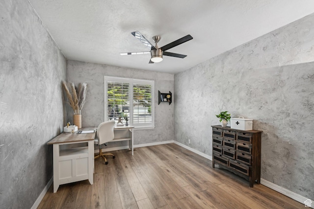 11732 S Lampton View Dr W, South Jordan, UT 84095 - home office with wood finished floors, ceiling fan, and baseboards