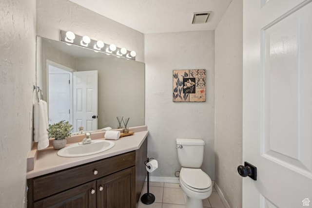 11732 S Lampton View Dr W, South Jordan, UT 84095 - half bath with vanity, toilet, tile patterned flooring, and baseboards