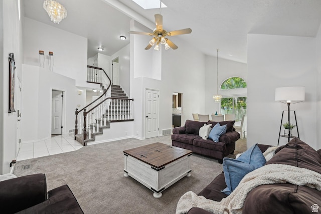 11732 S Lampton View Dr W, South Jordan, UT 84095 - living room featuring high vaulted ceiling, stairs, carpet floors, baseboards, and a chandelier