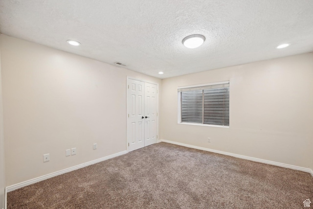 11732 S Lampton View Dr W, South Jordan, UT 84095 - carpeted empty room with a textured ceiling, baseboards, and recessed lighting