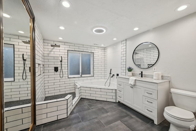 11732 S Lampton View Dr W, South Jordan, UT 84095 - full bathroom featuring a garden tub, vanity, recessed lighting, a shower stall, and toilet