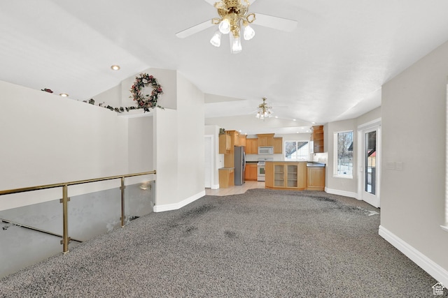 338 N 1090 W, Hyrum, UT 84319 - unfurnished living room featuring baseboards, vaulted ceiling, light colored carpet, ceiling fan, and recessed lighting