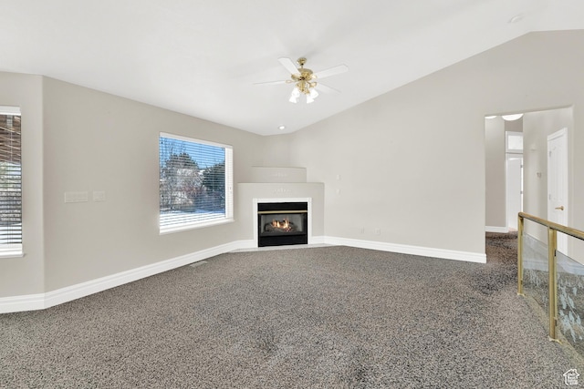 338 N 1090 W, Hyrum, UT 84319 - unfurnished living room with ceiling fan, healthy amount of natural light, vaulted ceiling, and carpet flooring