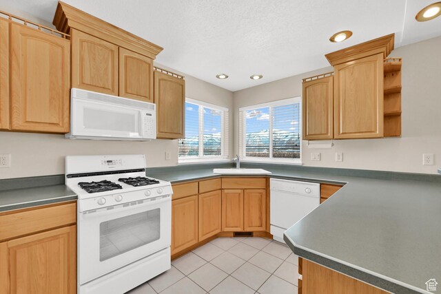 338 N 1090 W, Hyrum, UT 84319 - kitchen featuring white appliances, a sink, light brown cabinetry, recessed lighting, and light tile patterned floors