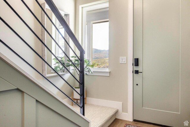 386 W Ascent Dr Unit 257, Hideout, UT 84036 - foyer featuring stairs, a mountain view, and baseboards