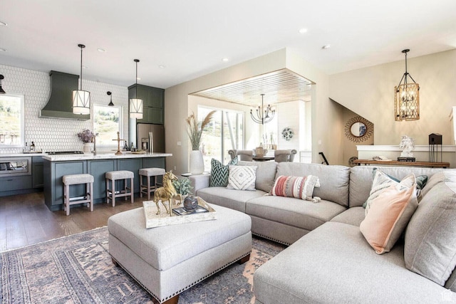 386 W Ascent Dr Unit 257, Hideout, UT 84036 - living room with a chandelier, recessed lighting, and dark wood-style floors