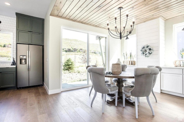 386 W Ascent Dr Unit 257, Hideout, UT 84036 - dining space with a chandelier, recessed lighting, wood finished floors, wood ceiling, and baseboards