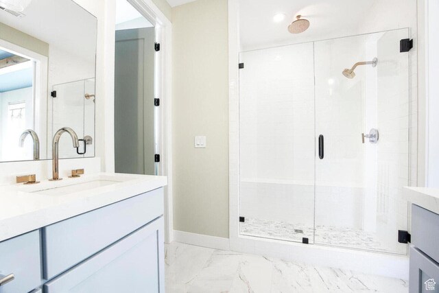 386 W Ascent Dr Unit 257, Hideout, UT 84036 - bathroom featuring marble finish floor, vanity, a shower stall, and visible vents