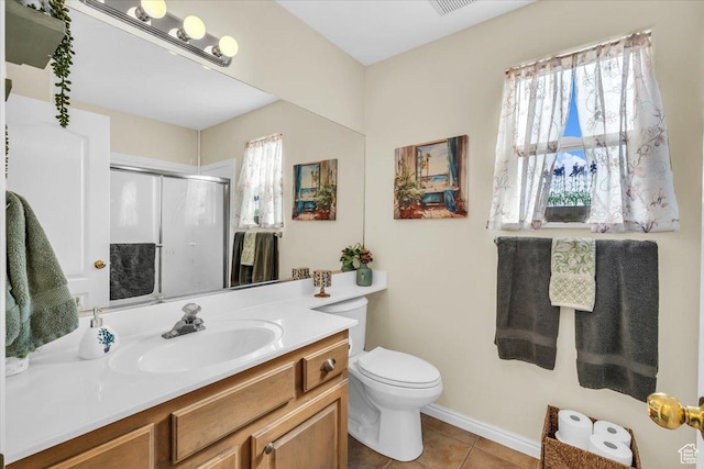 bathroom featuring visible vents, toilet, tile patterned flooring, vanity, and a shower stall