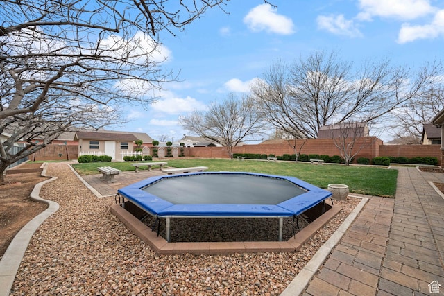 155 W 960 S, Hurricane, UT 84737 - view of swimming pool featuring a trampoline, fence, and a lawn