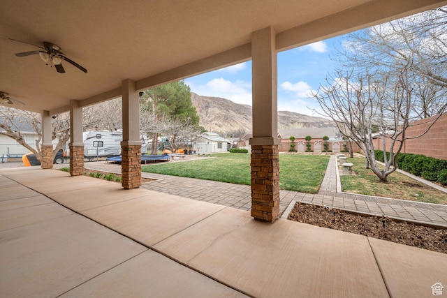155 W 960 S, Hurricane, UT 84737 - view of patio with fence, a mountain view, and ceiling fan