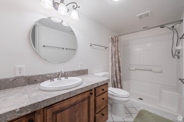 155 W 960 S, Hurricane, UT 84737 - bathroom featuring vanity, visible vents, toilet, a shower with shower curtain, and tile patterned floors