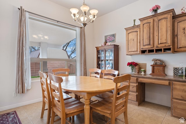 155 W 960 S, Hurricane, UT 84737 - dining space with light tile patterned floors, a notable chandelier, and baseboards