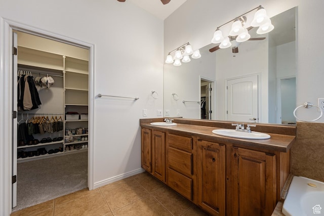 155 W 960 S, Hurricane, UT 84737 - bathroom with tile patterned floors, double vanity, ceiling fan, and a sink