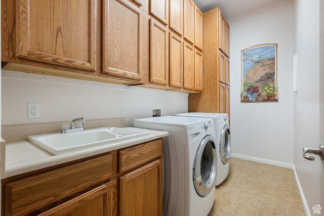 155 W 960 S, Hurricane, UT 84737 - washroom featuring baseboards, washing machine and dryer, light tile patterned flooring, cabinet space, and a sink