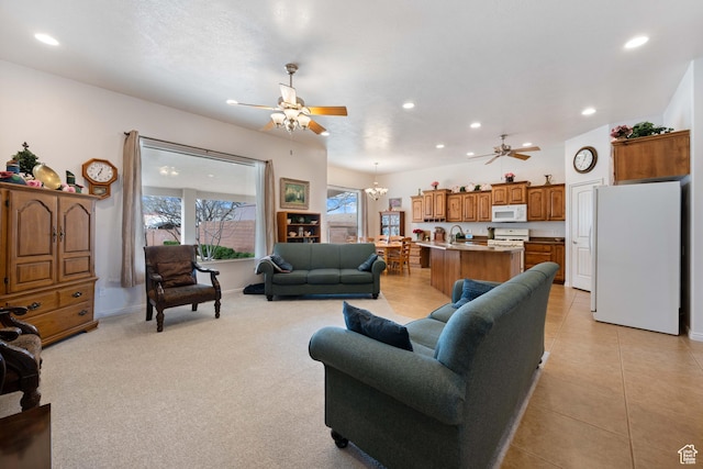 155 W 960 S, Hurricane, UT 84737 - living area featuring recessed lighting, light tile patterned floors, light colored carpet, and a ceiling fan