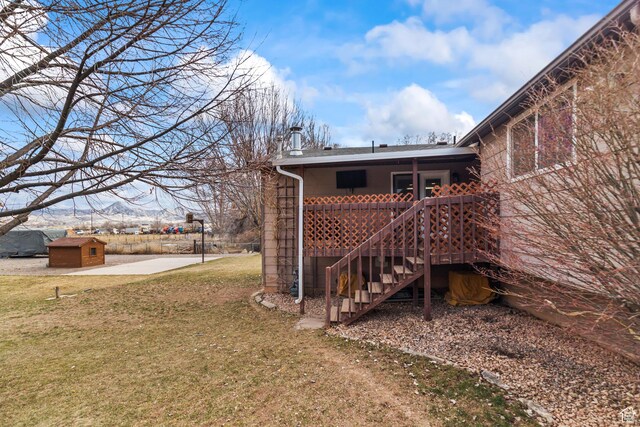 79 S 250 E, Aurora, UT 84620 - view of yard with stairway, a deck, and an outbuilding