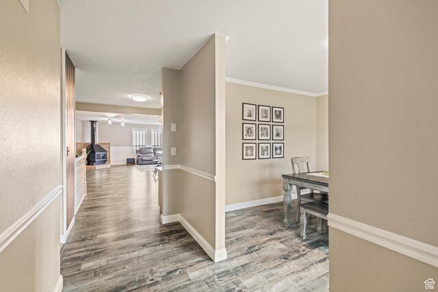 79 S 250 E, Aurora, UT 84620 - corridor featuring ornamental molding, wood finished floors, and baseboards