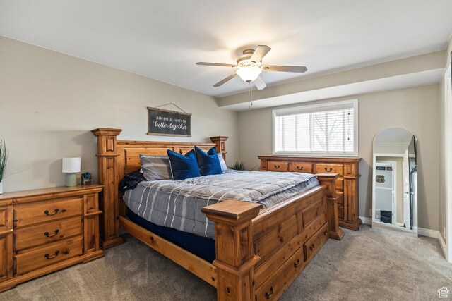 79 S 250 E, Aurora, UT 84620 - bedroom featuring a ceiling fan, arched walkways, light colored carpet, and baseboards