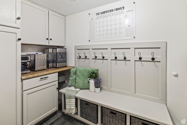 79 S 250 E, Aurora, UT 84620 - mudroom featuring a textured ceiling