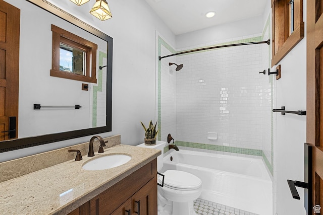 bathroom with vanity, bathing tub / shower combination, toilet, and recessed lighting