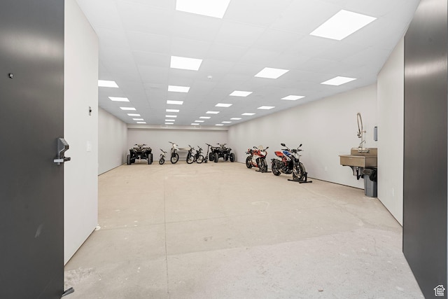 interior space featuring a drop ceiling