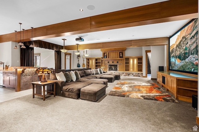 living area with light carpet and a fireplace