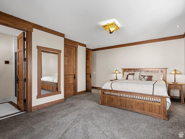 bedroom with carpet flooring and baseboards