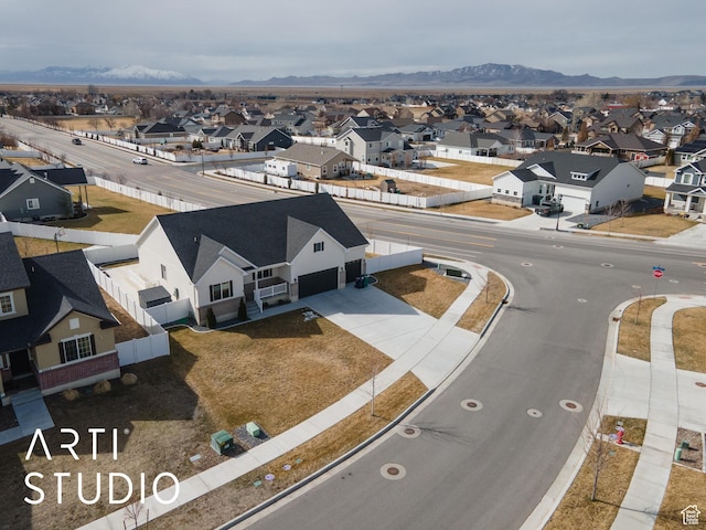 aerial view with a mountain view and a residential view