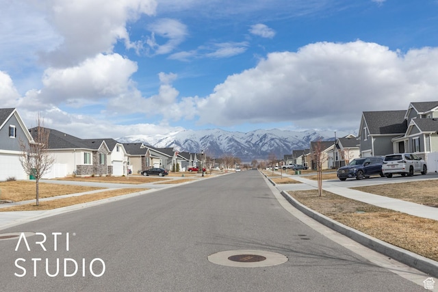 view of street with a residential view and sidewalks