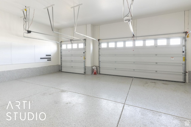 garage featuring a garage door opener