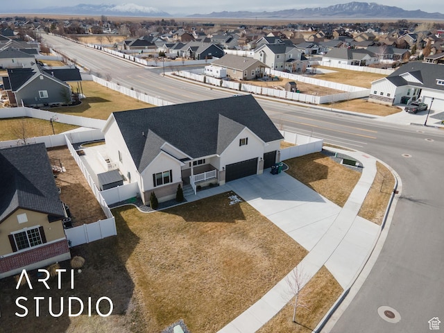 aerial view with a mountain view and a residential view