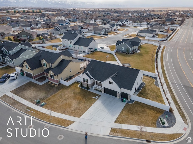 birds eye view of property with a residential view