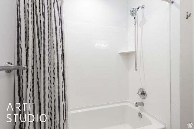 full bathroom with shower / tub combo